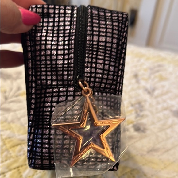 MAC Elegant Black and Gold Women's Cosmetic Bag
Soft Body - Picture 6 of 7